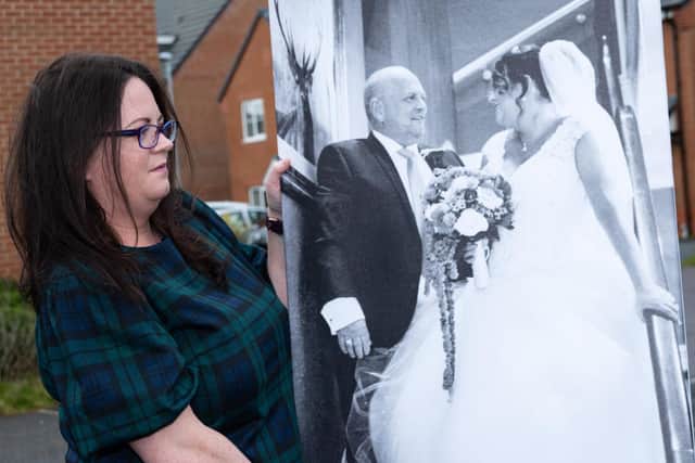Rachael looks at happy memories with her dad on her wedding day, before he sadly passed away from Covid-19
