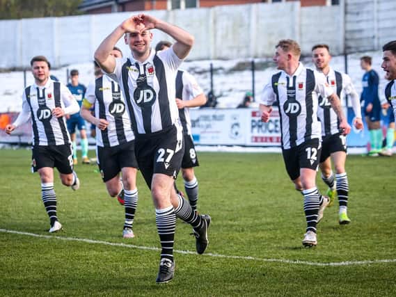 Connor Hall celebrates opening the scoring in the 2-0 win over Derby in the third round of the FA Cup at Victory Park
