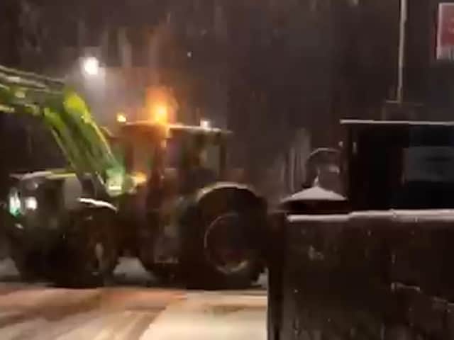 Tractor dumping at Hartford station in Cheshire. Storm Christoph had already forced the closure of several key rail links in the North West, but this act added Crewe to Warrington to the list