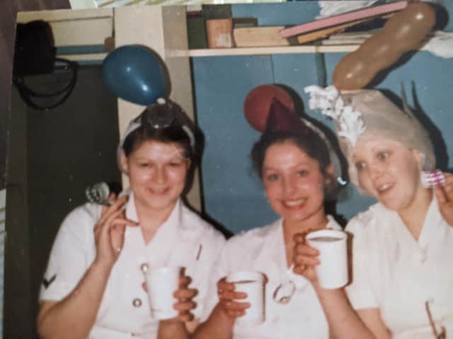 Shirley (centre) during her time as a chef at Aldershot