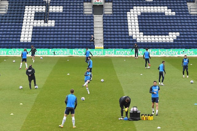 The Preston players warm up before the game.
