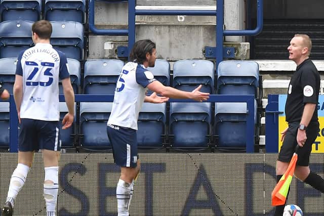 PNE left-back Joe Rafferty protests to the assistant referee after giving away the penalty against Reading