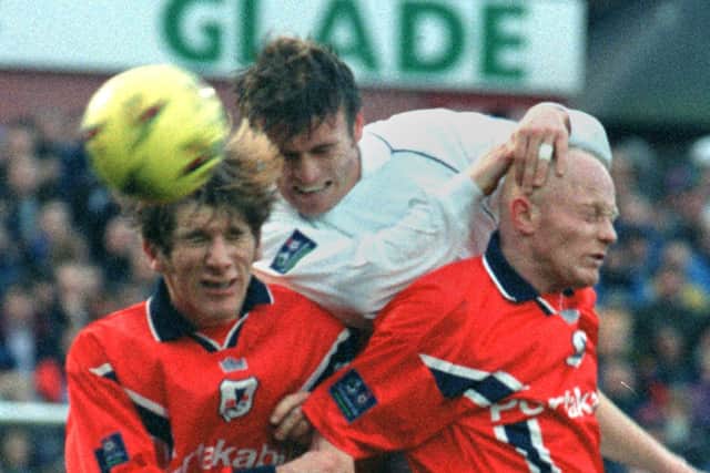 PNE right-back Gary Parkinson goes in with two York players - one of them future North End striker Richard Cresswell