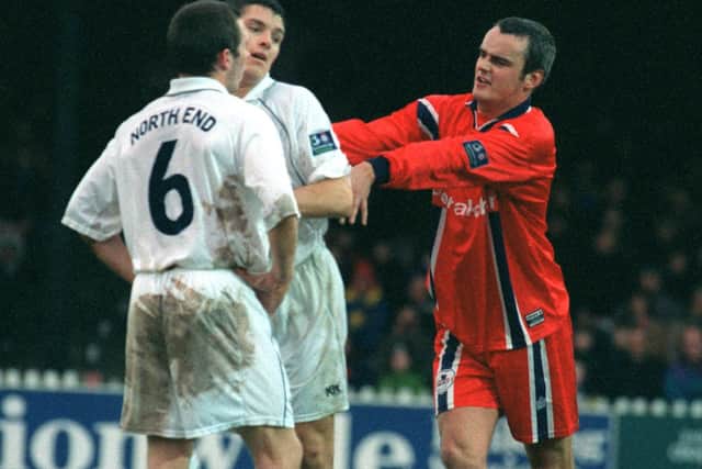 York midfielder Mark Tinkler clashes with PNE's Michael Jackson and Michael Appleton, leading to him getting a red card