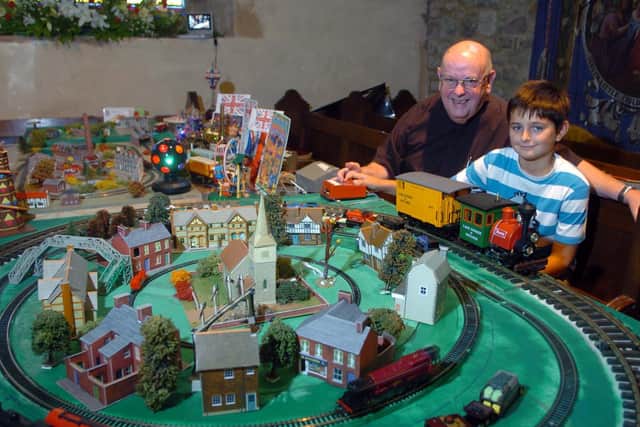 Canon Ron sharing his enthusiasm for model railways at St Helen's Churchtown Patronal Festival