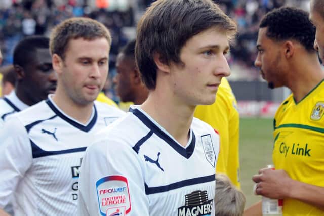 Ben Davies shakes hands with the Coventry players ahead of his Preston North End debut