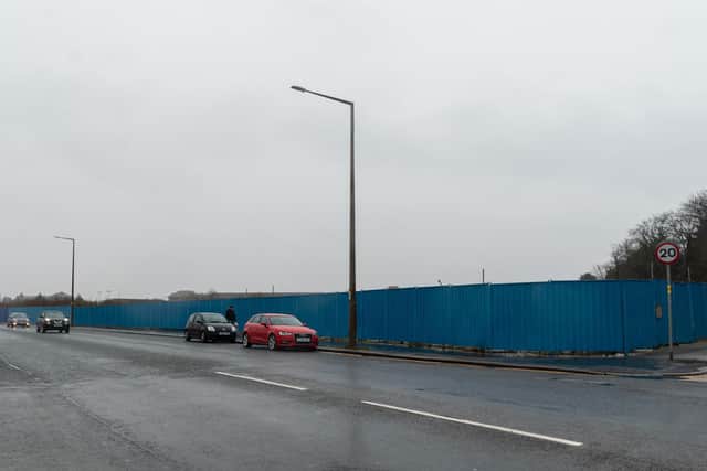 Blue hoarding surrounds the former Frontierland site in Morecambe.