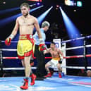 Isaac Lowe puts Alberto Buevara down. Picture: Mikey Williams/top Rank