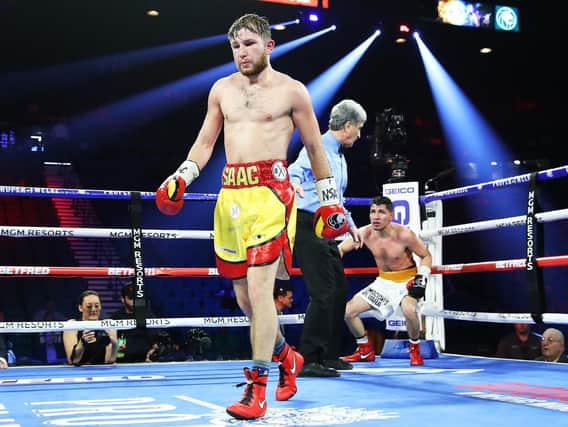 Isaac Lowe puts Alberto Buevara down. Picture: Mikey Williams/top Rank