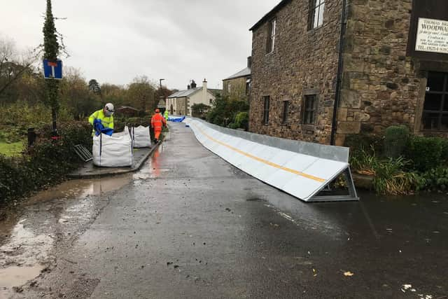 Temporary flood barriers at Ribchester, put in place by the Environment Agency during Storm Christoph in January 2021