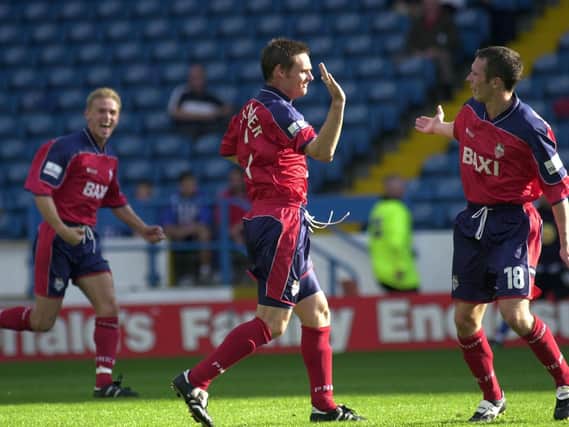 Graham Alexander is congratulated by Michael Appleton after scoring in Preston North End's win against Sheffield Wednesday in September 2000