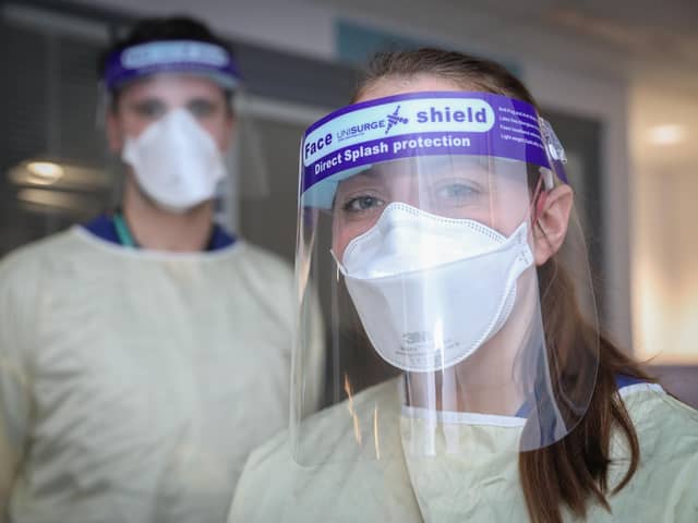 ICU staff in full PPE on the wards