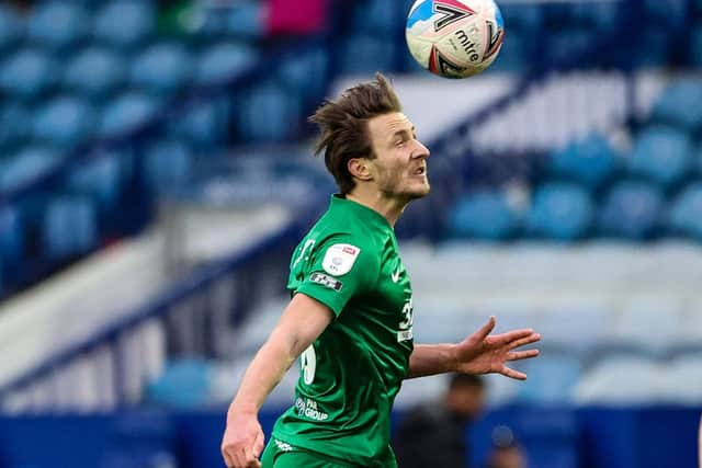 Preston North End defender Ben Davies heads clear against Sheffield Wednesday at Hillsborough