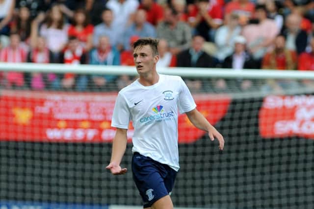 PNE defender Ben Davies in action against Liverpool at Deepdale in a pre-season friendly in July 2014