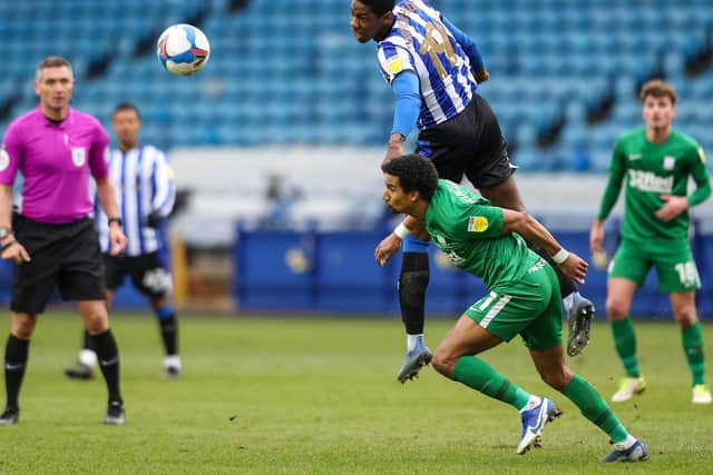 Sheffield Wednesday's Osaze Urhoghide gets above PNE winger Scott Sinclair