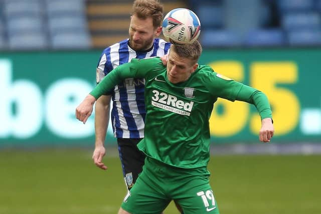 PNE striker Emil Riis is challenged by Sheffield Wednesday skipper Tom Lees