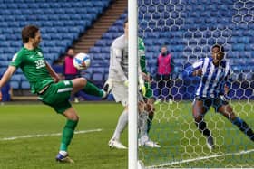 Ben Davies clears off the line at Hillsborough