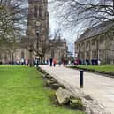 Dozens of people line up outside Blackburn