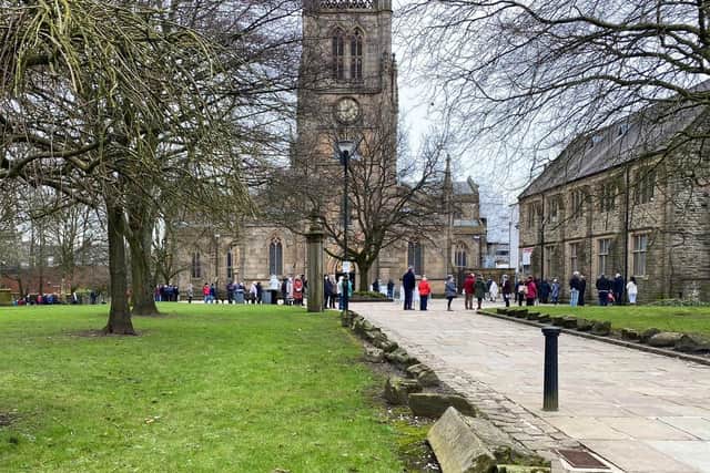 Dozens of people line up outside Blackburn