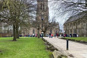 Dozens of people line up outside Blackburn