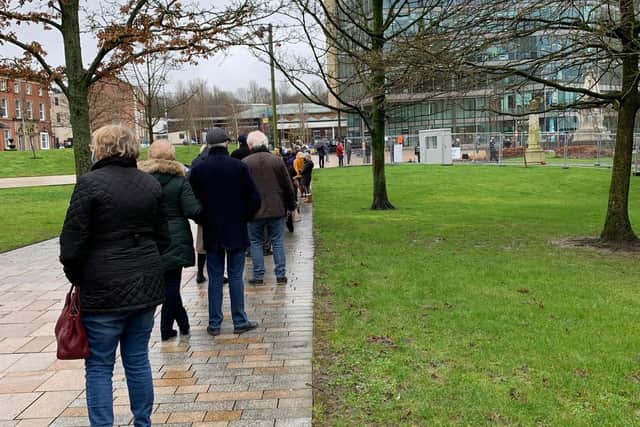 Patients were trying their best to main social distancing while queuing for long hours for their jabs