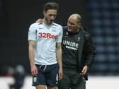 Former Preston defender Ben Davies alongside Alex Neil.