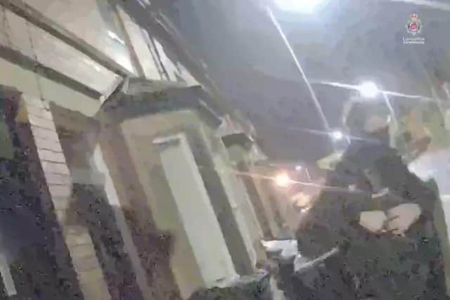 Bodycam footage shows the moment police stormed an illegal house party in Ormskirk.
