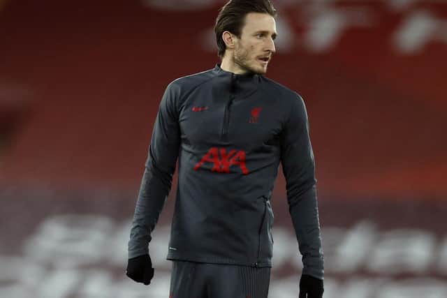Former Preston North End defender Ben Davies warming-up for Liverpool before their game with Brighton on Wednesday night