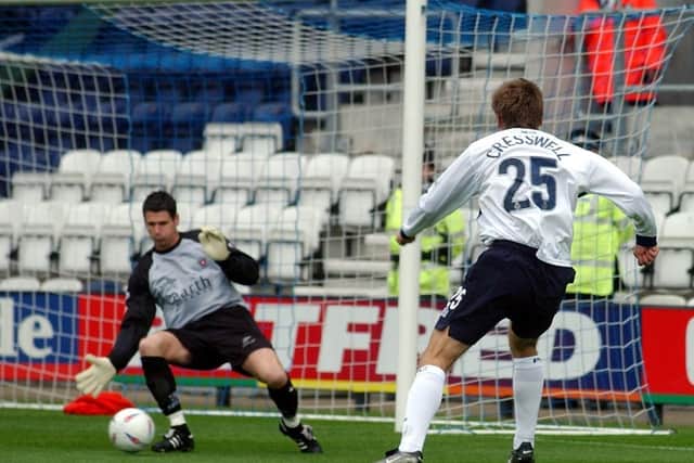 Preston North End striker Richard Cresswell fires past Rotherham goalkeeper Mike Pollitt at Deepdale in September 2003