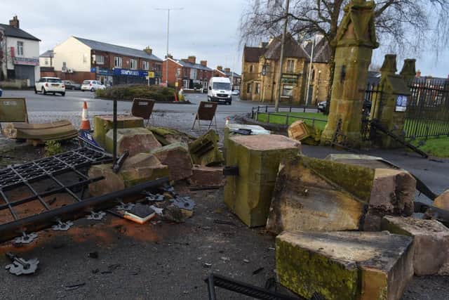 Pictures from the scene show the extent of the damage to the cemetery entrance, where parts of itsstone wall and iron gates have been left shattered on the ground