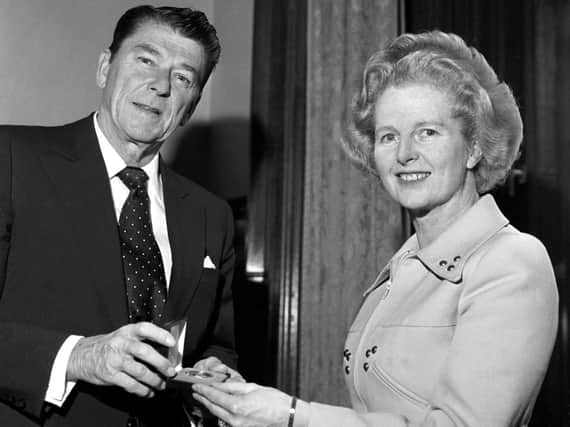 Ronald Reagan with Margaret Thatcher (credit PA Wire)