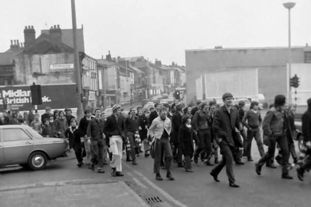 Fans cross Friargate ahead of PNE's FA Cup tie against Manchester United in February 1972