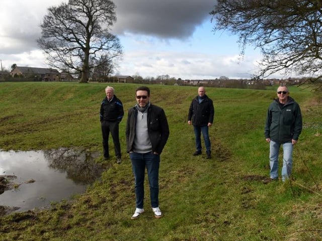 Members of the residents association in the field off Town Ln, Whittle-le-Woods, where new houses are proposed