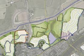 The development proposal site to the south of the Bay Gateway.