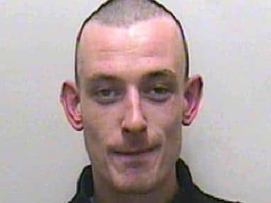 Michael Foster (pictured) is described as white, 6ft 1in tall, of slim build with short, dark-brown hair. (Credit: Lancashire Police)