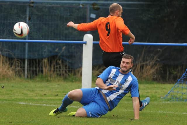 George in action for Coppull Utd in 2016