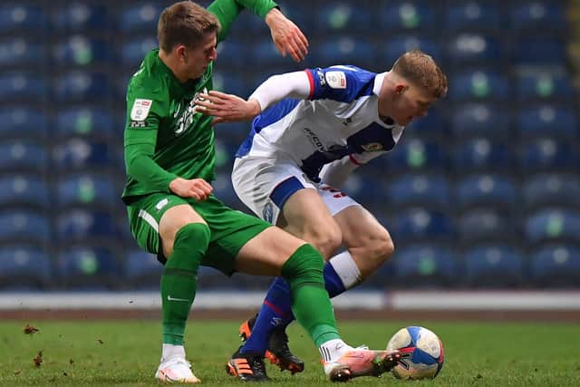 Preston’s Emil Riis battles with Blackburn Rovers’ Jarrad Branthwaite
