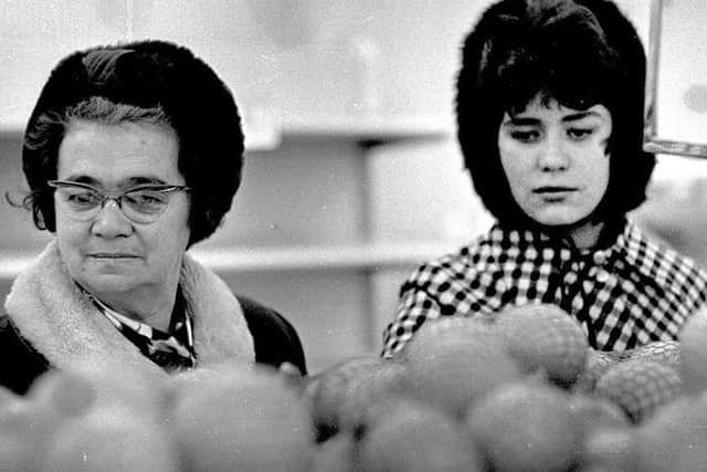 Monday February 15, 1971 Decimalisation Day... Shoppers at a Marks and Spencer store try to get their heads around the new prices