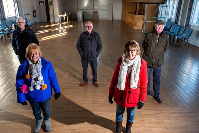 Fundraisers and supporters of the project to transform the memorial hall at Hurst Green, pictured inside the hall