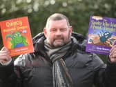 Glenn Beavers with two of his new books