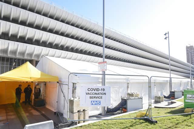 A large tent has been erected on the bus station concourse for patients to wait in