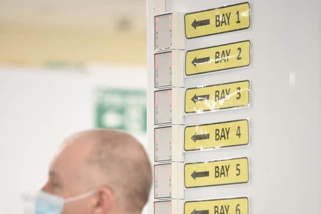 A traffic light system lets people know when bays are free