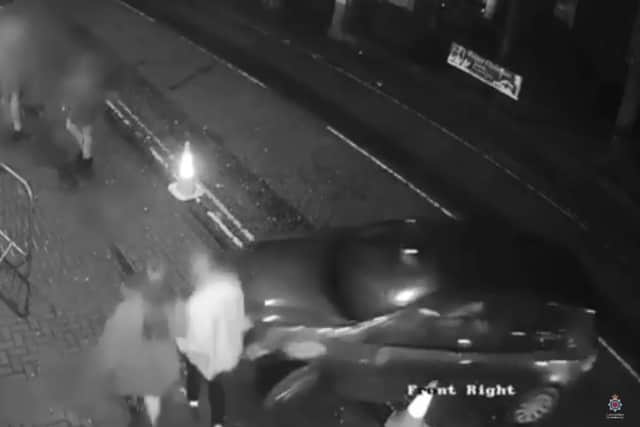 Dashcam footage shows Clarke mounting the pavement in a blue Volkswagen Golf before accelerating and knocking the pair to the ground. (Credit: Lancashire Police)