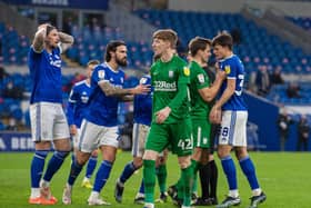 Cardiff players protest at the awarding of a second penalty against Preston