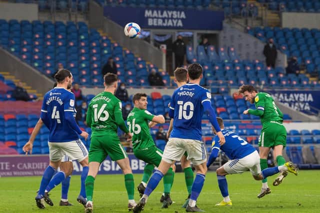 North End skipper Alan Browne gets in a header against Cardiff