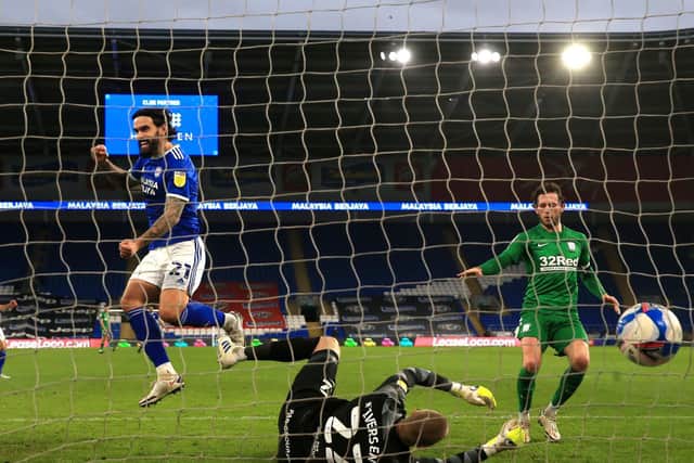 PNE keeper Daniel Iversen and Alan Browne can only watch as Marlon Pack scores Cardiff's third goal