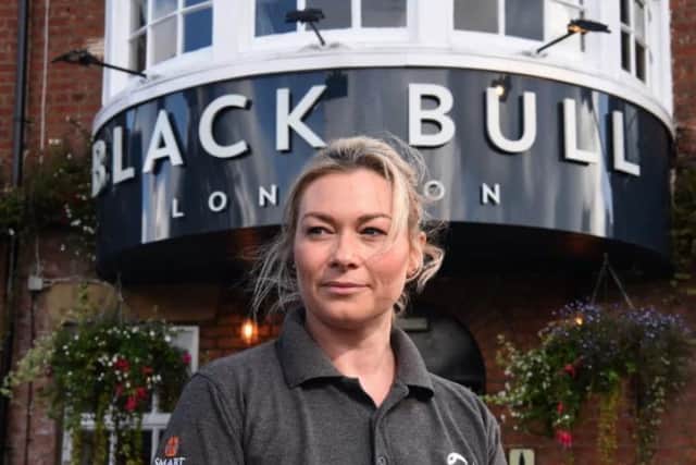 Janine Vanden says she needs to think things over before deciding whether to open the Black Bull in April for outdoor service only.