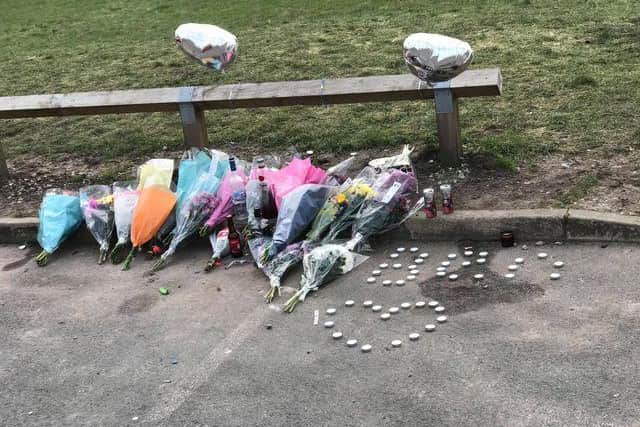 A council worker parked in a bay at Bamber Bridge Leisure Centre car park where one of the van wheels crushed some of the tributes to Ben Smith