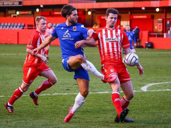 Harry Cardwell (blue strip) has joined Stockport County
(photo: Stefan Willoughby)