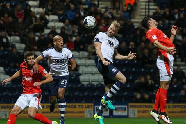 Tom Clarke heads PNE into the lead against his former club Huddersfield